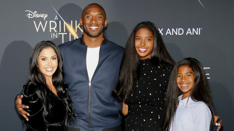 Vanessa, Kobe, Natalia and Gianna Bryant pose on the red carpet