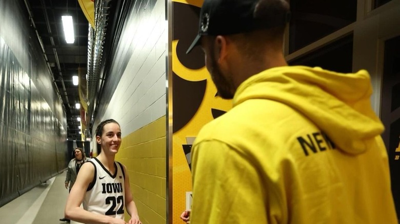 Caitlin Clark smiling at Connor McCaffery