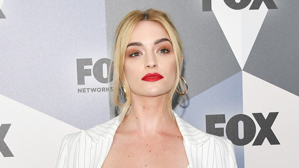 Brianne Howey in white