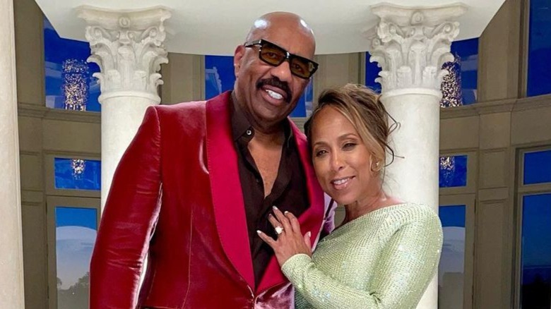 Steve Harvey and Marjorie Harvey posing together