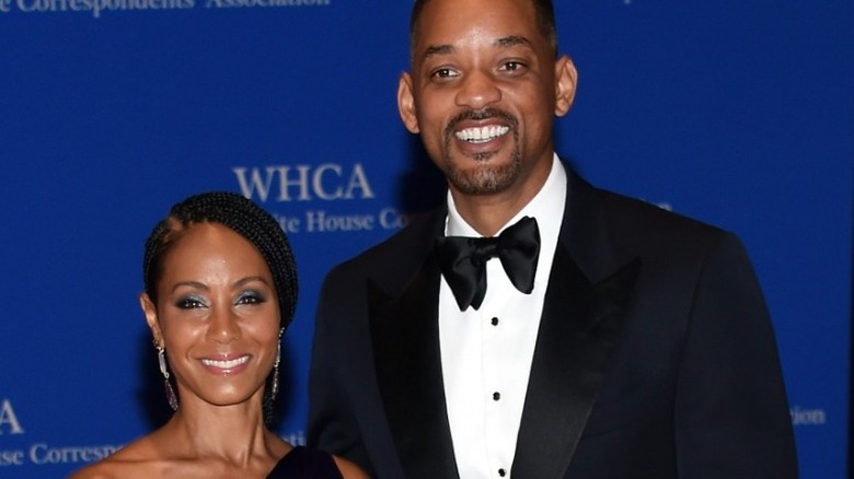 Will Smith and his wife smiling