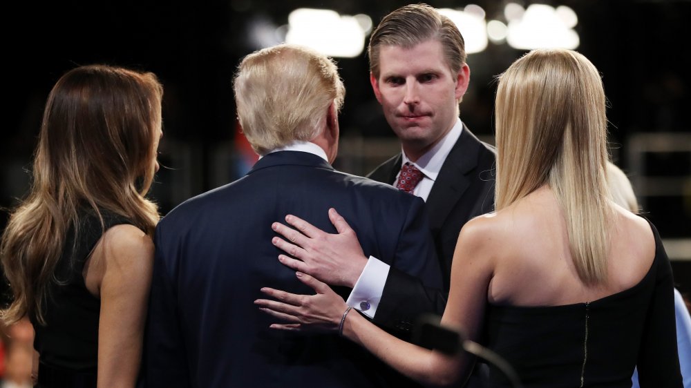 Melania Trump, Donald Trump, Eric Trump, and Ivanka Trump embracing