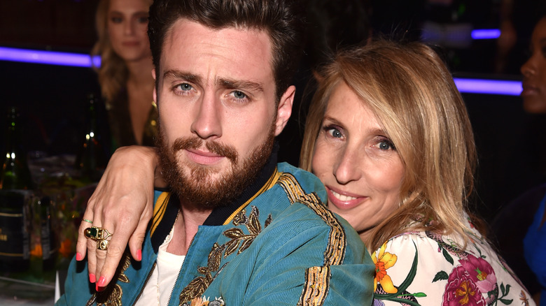 Sam Taylor-Johnson hugging Aaron Taylor-Johnson