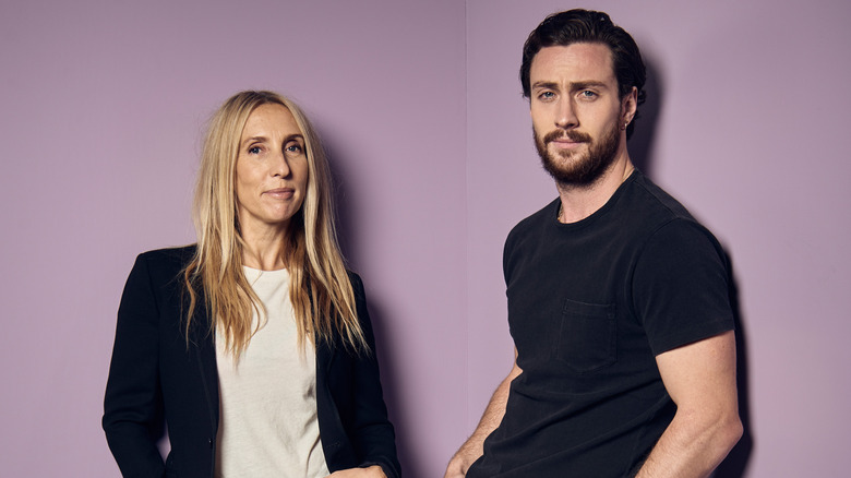 Sam and Aaron Taylor-Johnson pose for a portrait 