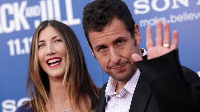 Adam Sandler with wife Jackie, both posing