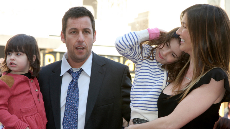 Adam Sandler with his family, all smiling