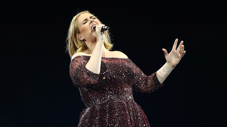 Adele performing at event 