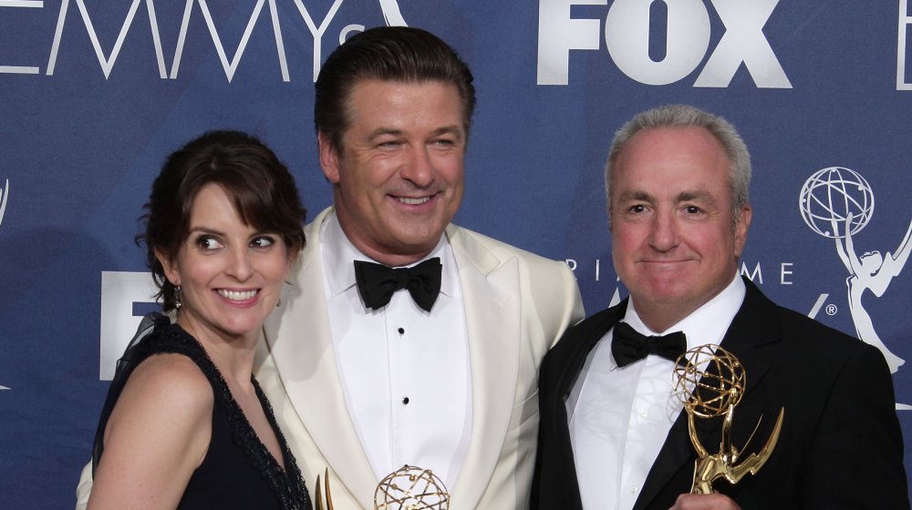 Actress Tina Fey, producer Lorne Michaels, and actor Alec Baldwin pose in the pressroom with her Emmy for "Outstanding Comedy Series" for "30 Rock" during the 59th Annual Primetime Emmy Awards