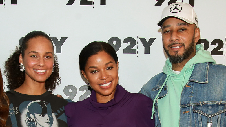 Alicia Keys, Mashonda Tifrere, Swizz Beatz smiling