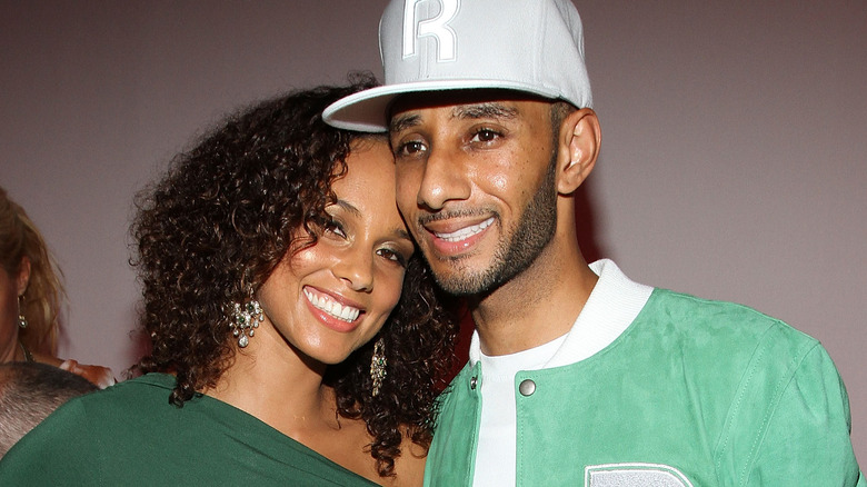 Alicia Keys and Swizz Beatz smiling