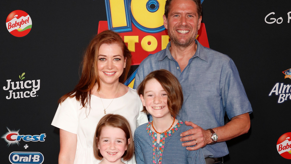 Alyson Hannigan and Alexis Denisof and kids, Toy Story 4 premiere red carpet 
