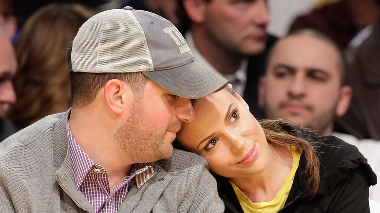 Alyssa Milano and her husband David Bugliari at a basketball game