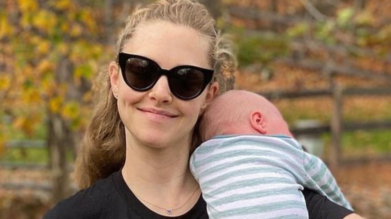 Amanda Seyfried and son posing