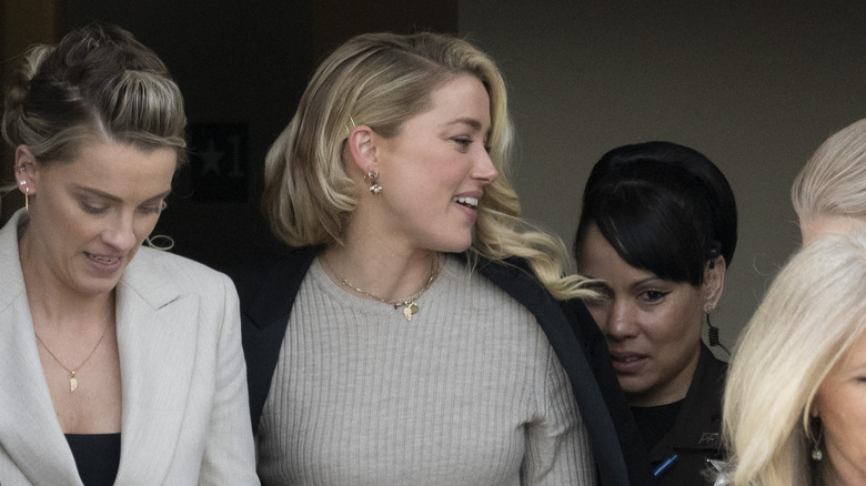 Whitney Henriquez and Amber Heard at an event  