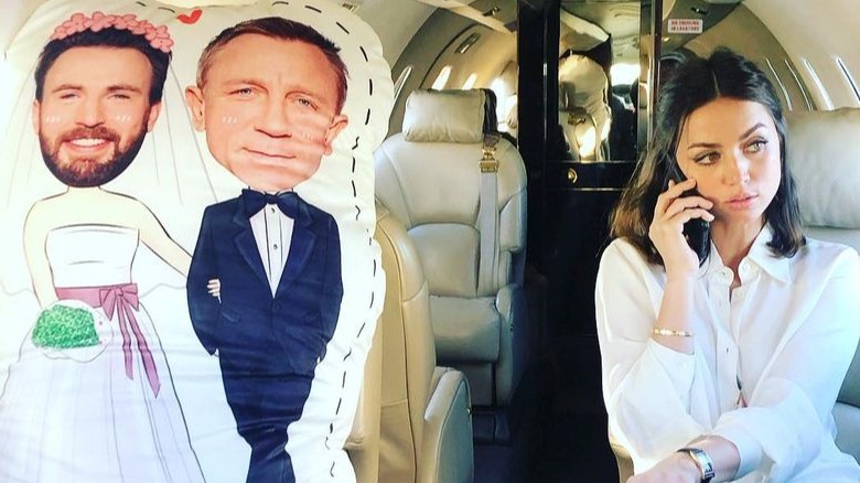 Ana de Armas with gag gift for Chris Evans and Daniel Craig