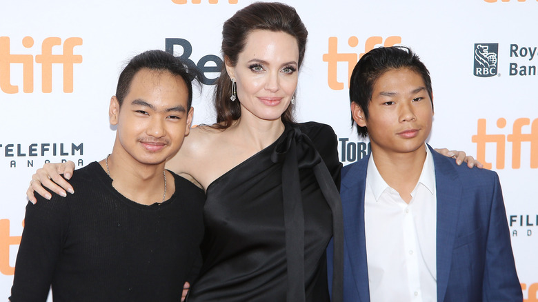 Angelina Jolie with sons Maddox and Pax on the red carpet