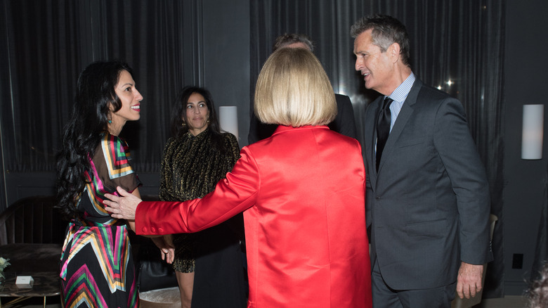 Anna Wintour with Huma Abedin and Rupert Everett