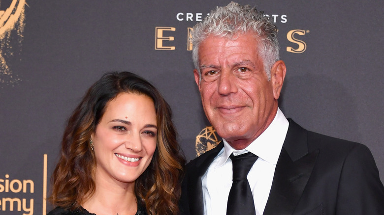 Asia Argento, Anthony Bourdain smiling