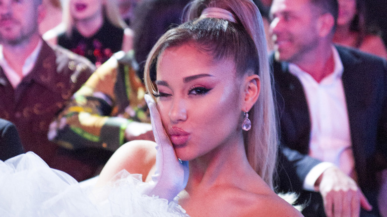 Ariana Grande makes kissy face