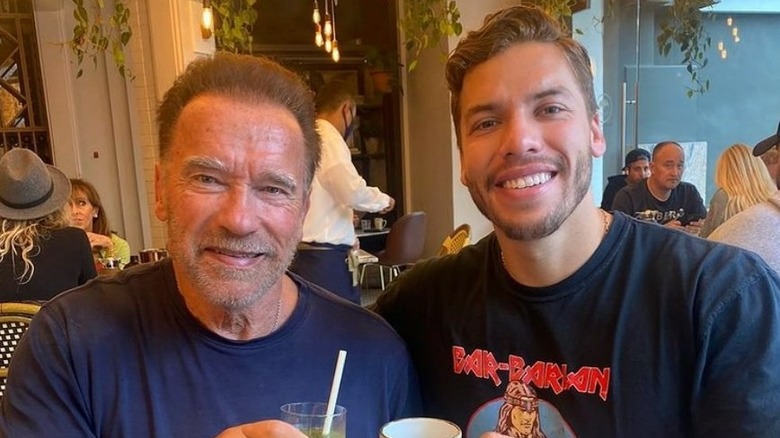 Arnold Schwarzenegger and Joseph Baena at restaurant