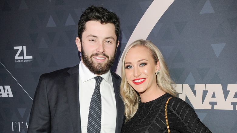 Baker Mayfield and Emily Wilkinson posing