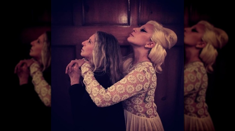 Barbra Streisand and Lady Gaga posing