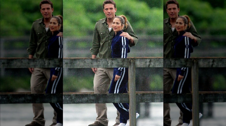 Ben Affleck walking with arm around Jennifer Lopez