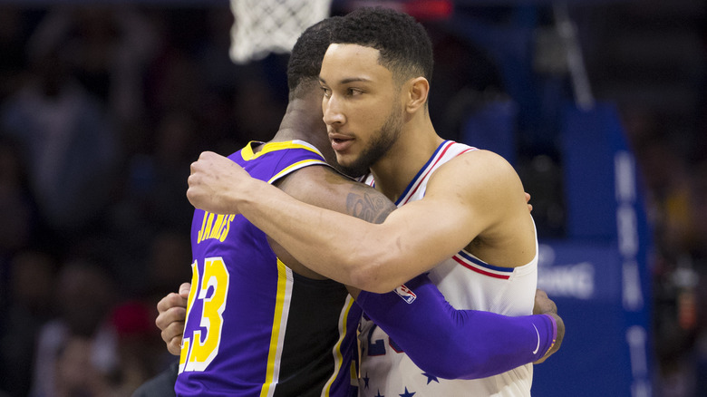 Ben Simmons hugs LeBron James