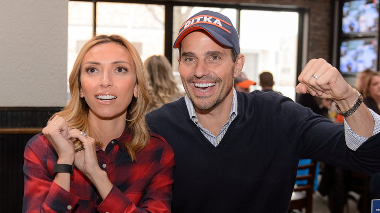 Bill and Giuliana Rancic cheering 