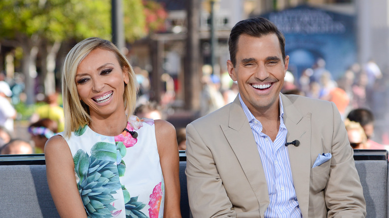 Bill and Giuliana Rancic laughing 