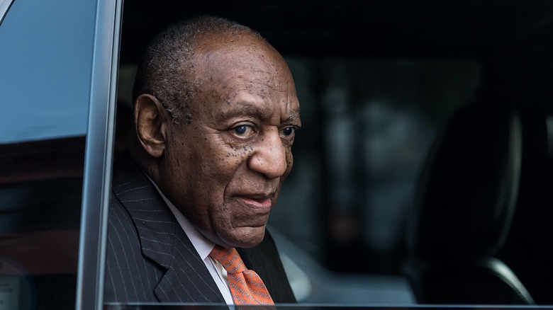 Bill Cosby leaves the courthouse in a car during his 2018 retrial