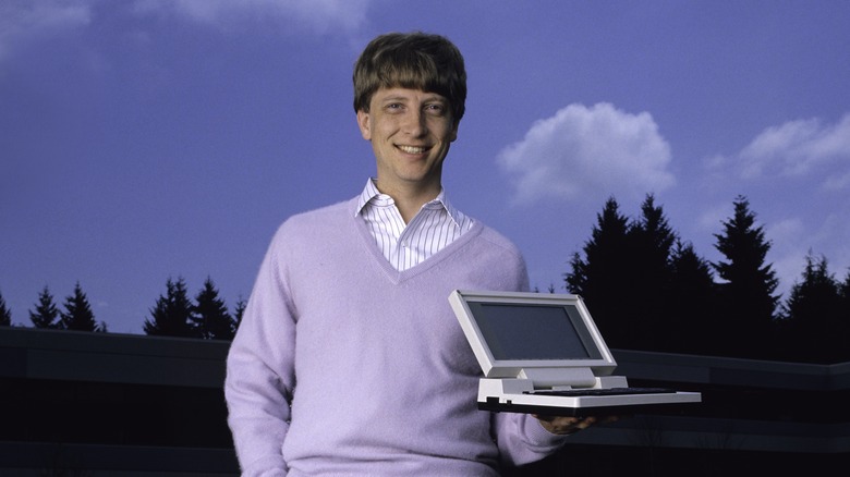 Bill Gates throwing his hands up