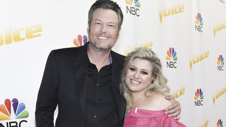 Blake Shelton and Kelly Clarkson posing together 2018