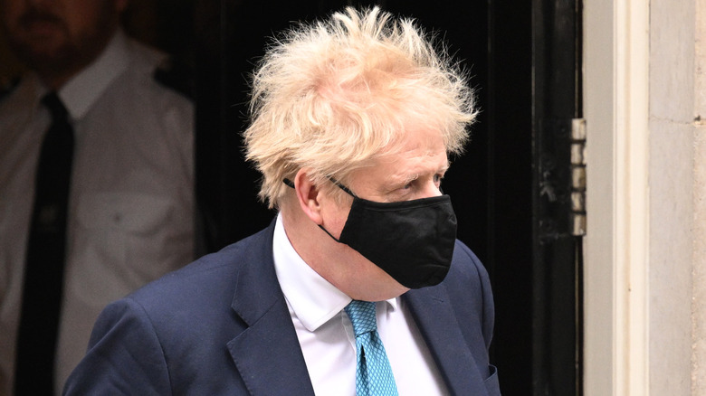 Boris Johnson's hair gets disheveled by the wind