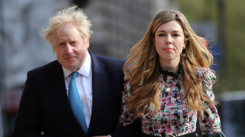 Boris Johnson and Carrie Symonds walking