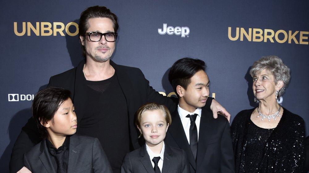 Brad Pitt, his mother, and some of his kids including Maddox