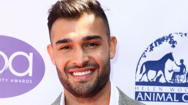 Sam Asghari smiling