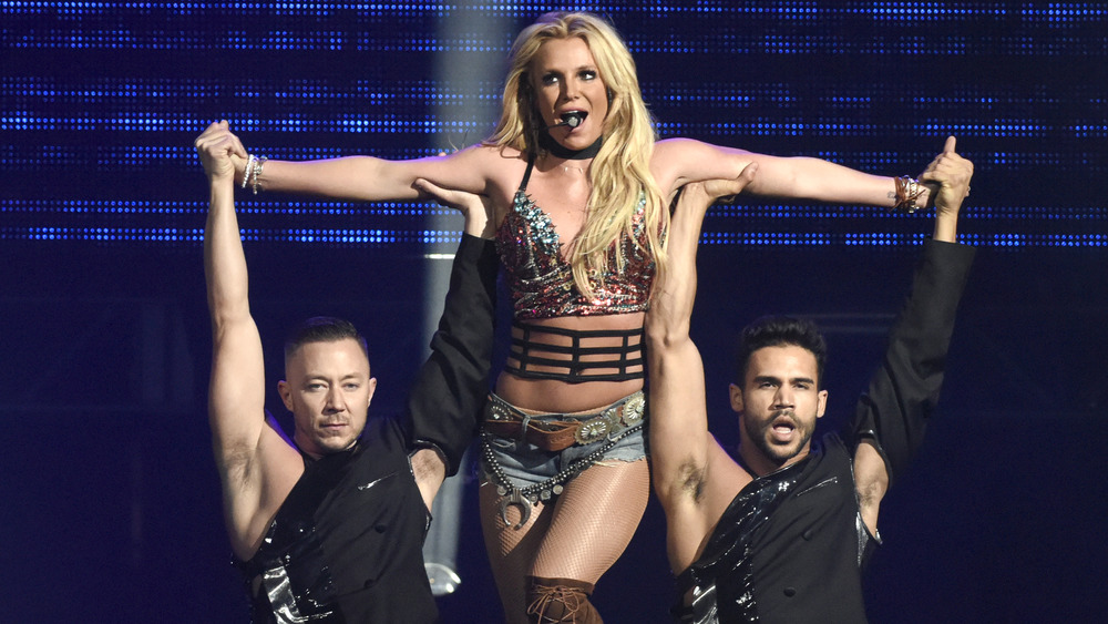 Britney Spears performing with her backup dancers