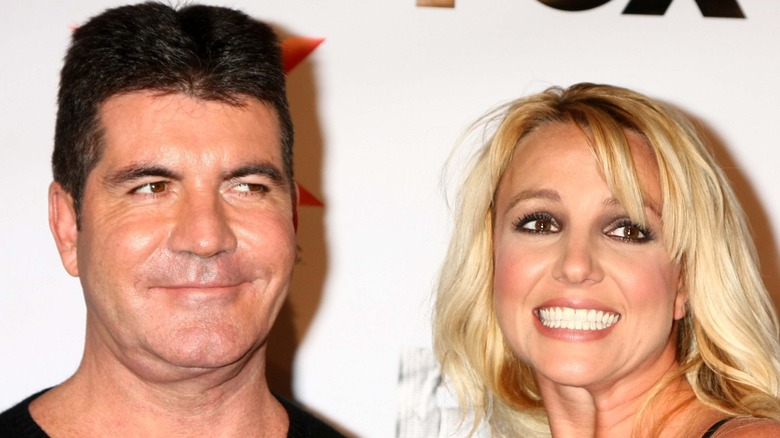 Simon Cowell and Britney Spears smiling