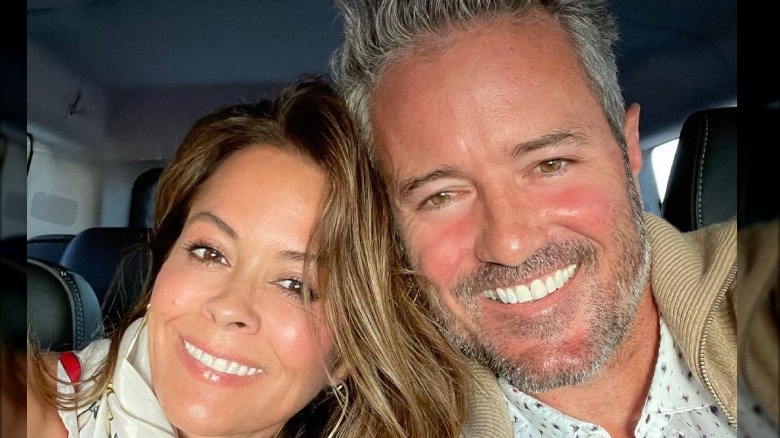 Brooke Burke and Scott Rigsby smiling