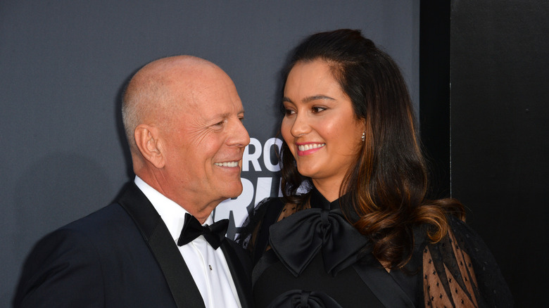 Bruce Willis and Emma Heming smiling