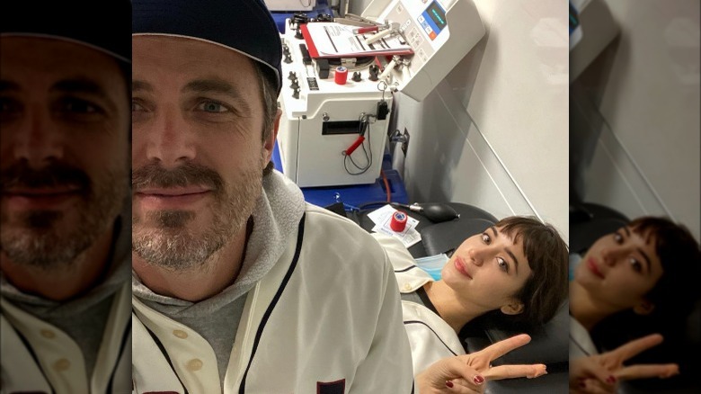 Casey Affleck and Caylee Cowan donating blood 