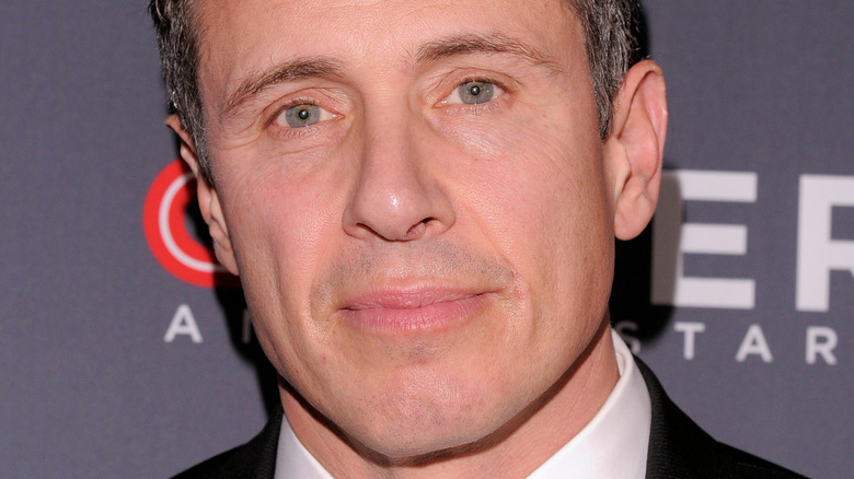 Chris Cuomo smiles at an event