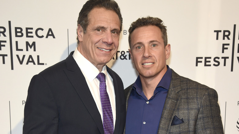 Chris Cuomo and Andrew Cuomo smiling