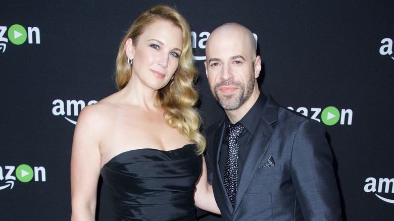 Deanna Daughtry and husband Chris Daughtry posing together