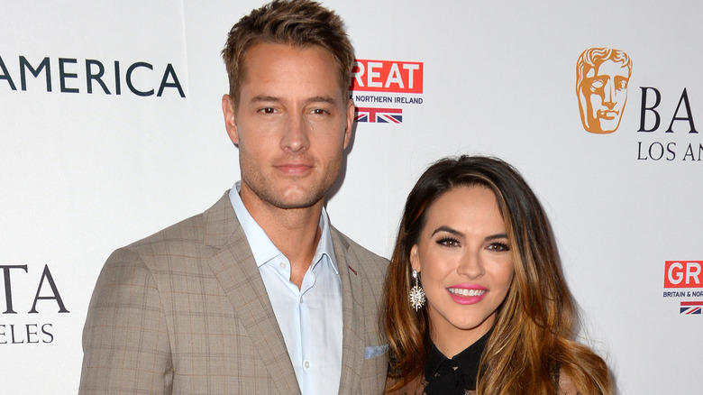 Justin Hartley and Chrishell Stause posing