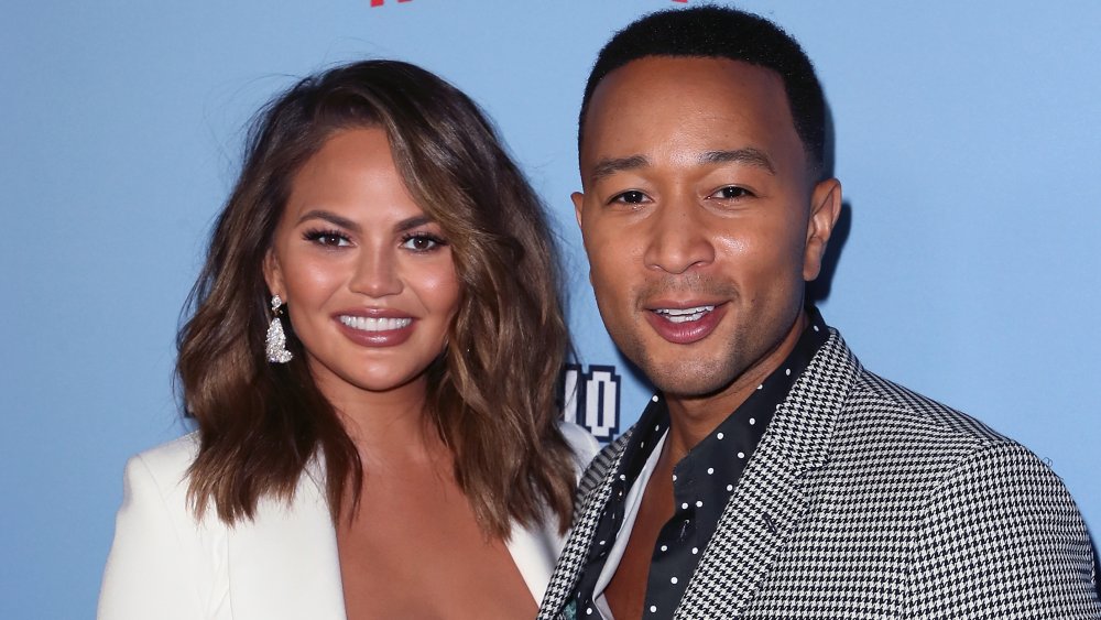  Chrissy Teigen (L) and John Legend attend the LA premiere of Netflix's "Between Two Ferns: The Movie"