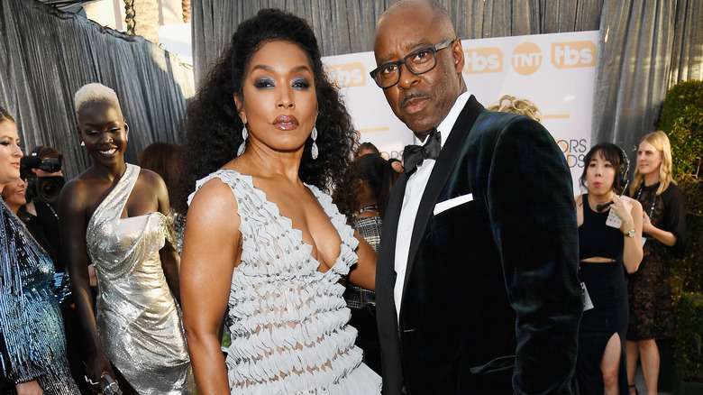 Angela Bassett and Courtney B. Vance posing