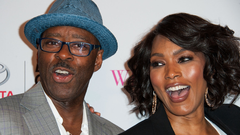 Courtney B. Vance and Angela Bassett laughing