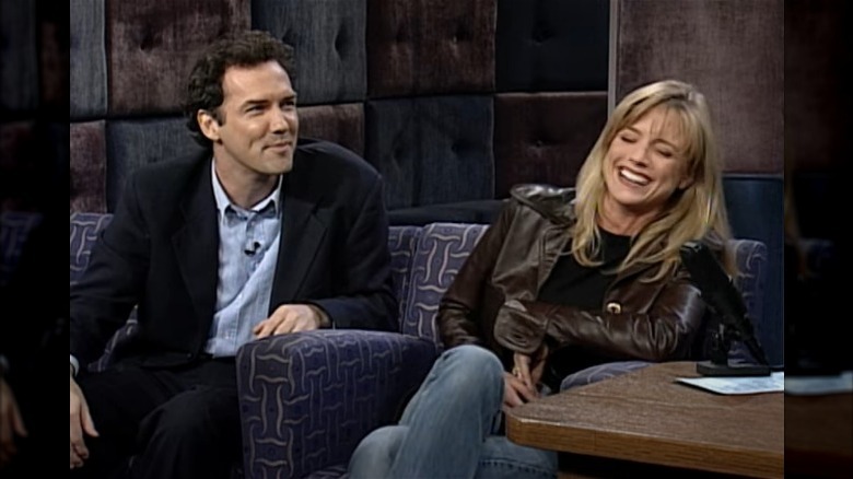 Norm Macdonald and Courtney Thorne Smith laughing